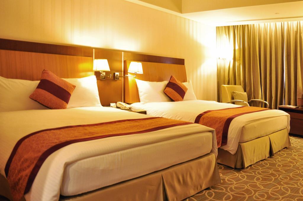 Evergreen Plaza Hotel - Tainan Oda fotoğraf A room at the hotel